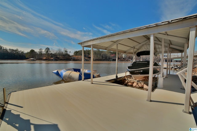 dock area with a water view