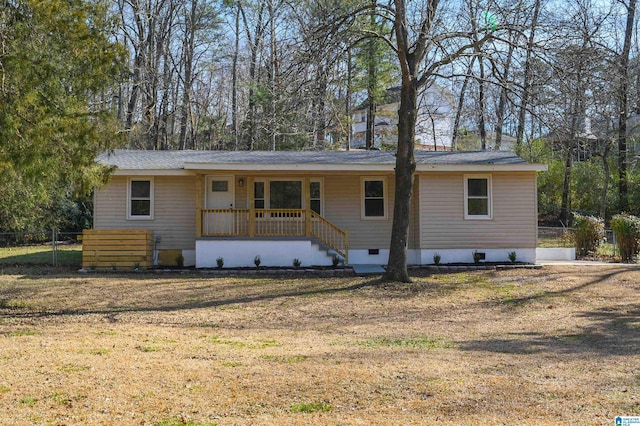 ranch-style home with a front yard