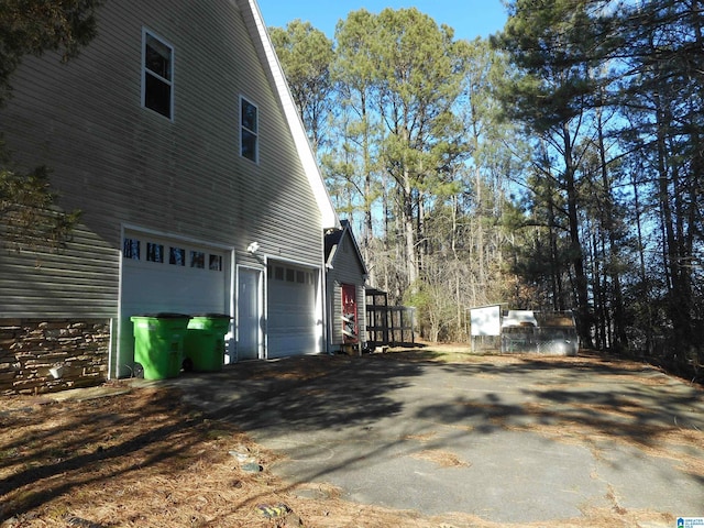 view of home's exterior with a garage