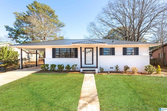 view of front of property with a front yard and a carport