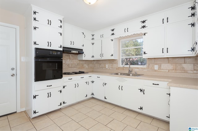 kitchen with black appliances, white cabinetry, sink, backsplash, and light tile patterned flooring