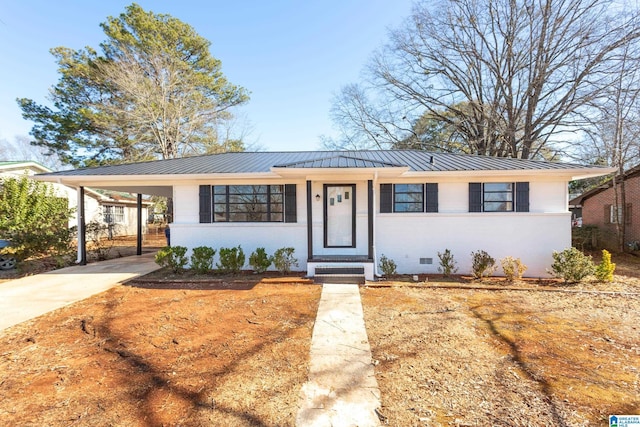 view of front of house featuring a carport