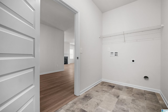 laundry room featuring electric dryer hookup and washer hookup