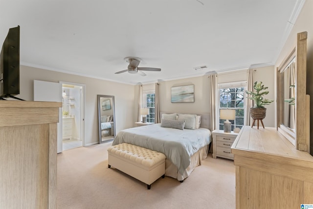 bedroom with multiple windows, ensuite bathroom, crown molding, and ceiling fan