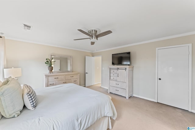 bedroom featuring ceiling fan, ornamental molding, and light carpet