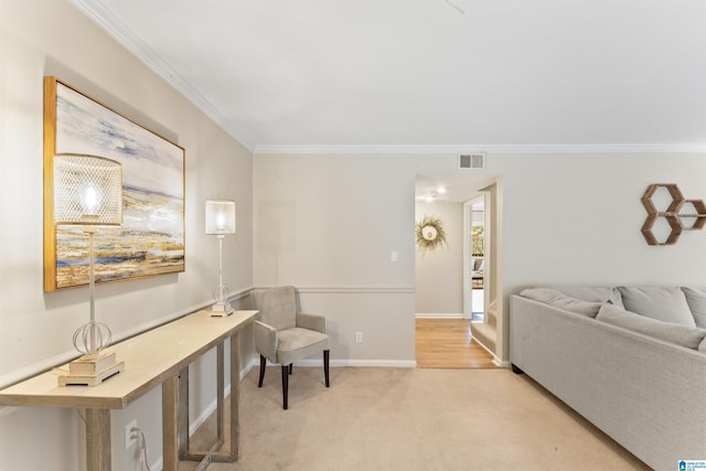 carpeted living room with crown molding