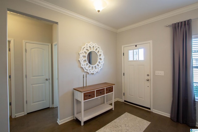 entryway with dark hardwood / wood-style flooring and ornamental molding