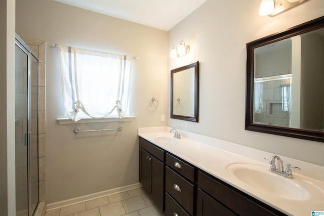 bathroom featuring walk in shower, tile patterned floors, and vanity