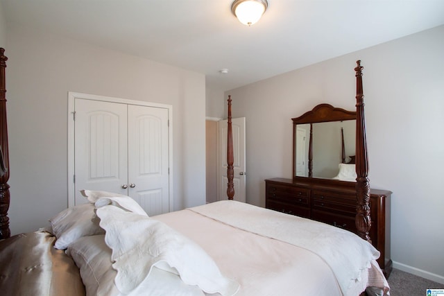 carpeted bedroom with a closet