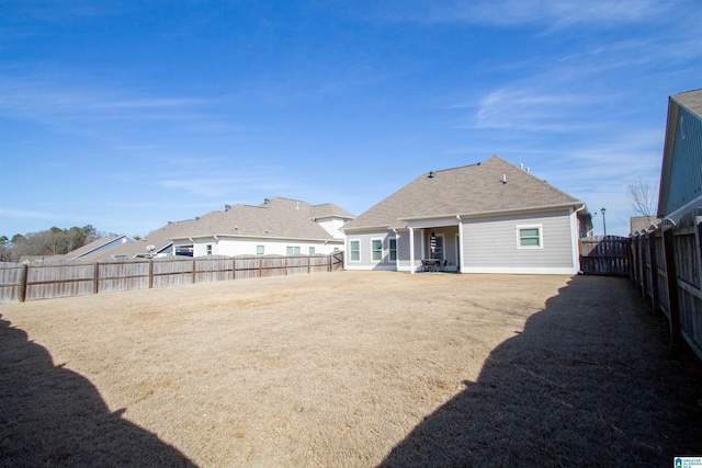 back of house featuring a patio area