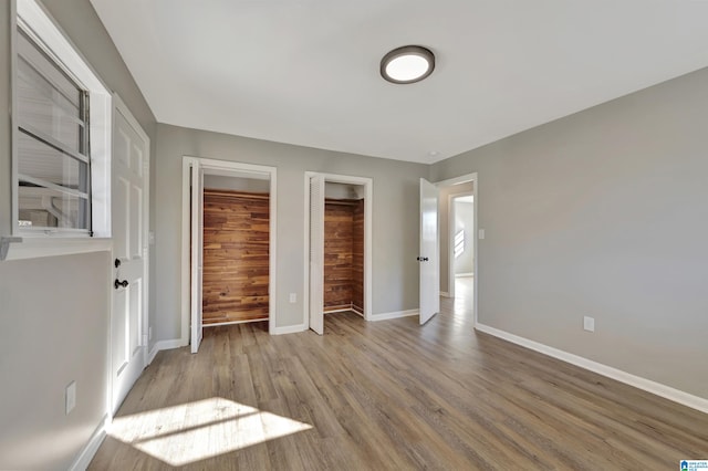 unfurnished bedroom featuring light hardwood / wood-style flooring