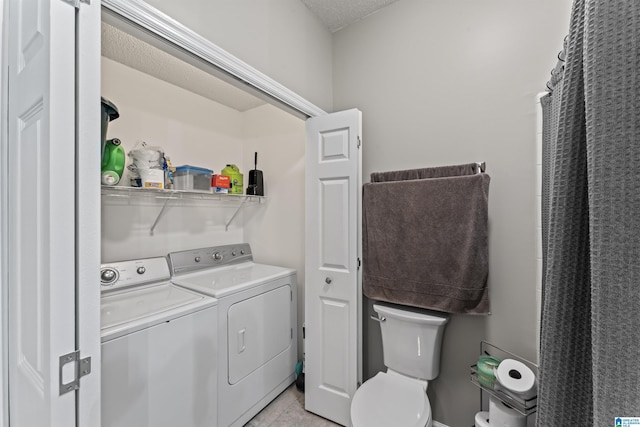 laundry room with washer and clothes dryer