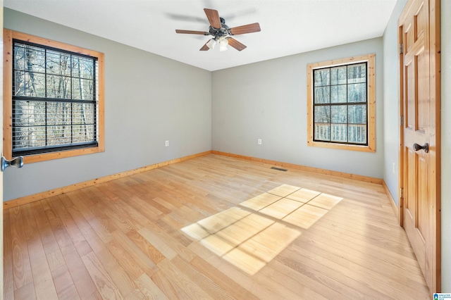 unfurnished bedroom with light wood-type flooring and ceiling fan