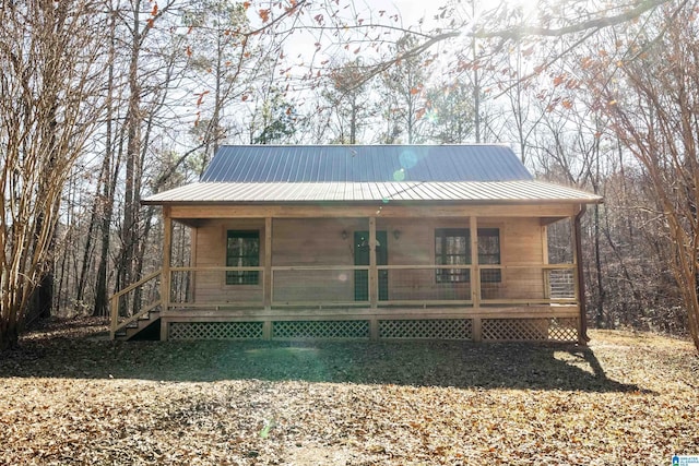 back of house with covered porch