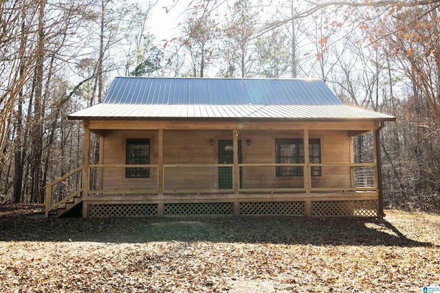 view of front of property featuring covered porch