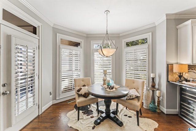 dining room featuring crown molding, beverage cooler, and dark wood-type flooring