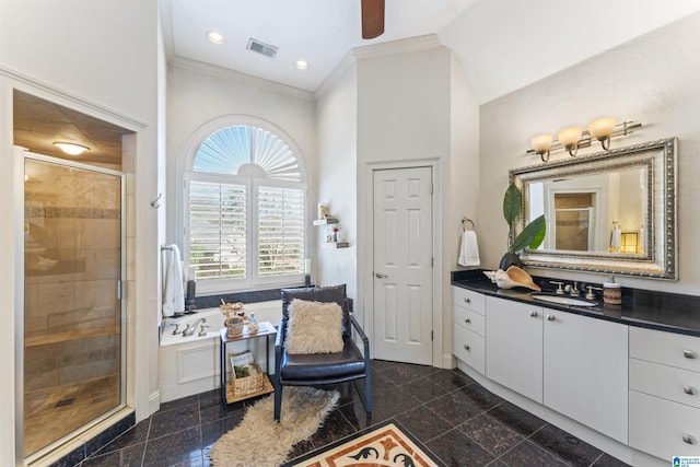 bathroom featuring vanity, ceiling fan, shower with separate bathtub, and ornamental molding