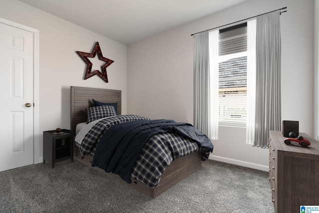 bedroom featuring light colored carpet