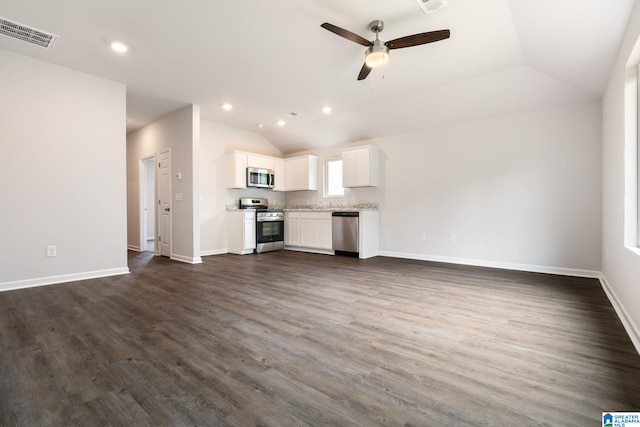 unfurnished living room with ceiling fan, dark hardwood / wood-style flooring, and lofted ceiling