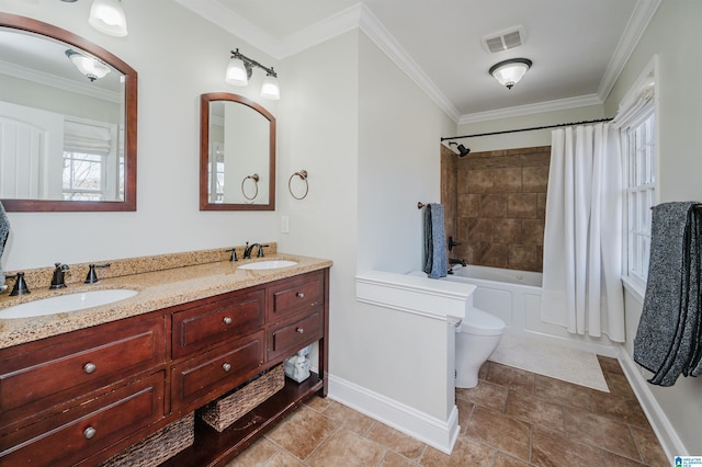 full bathroom with shower / bath combo, vanity, crown molding, and toilet