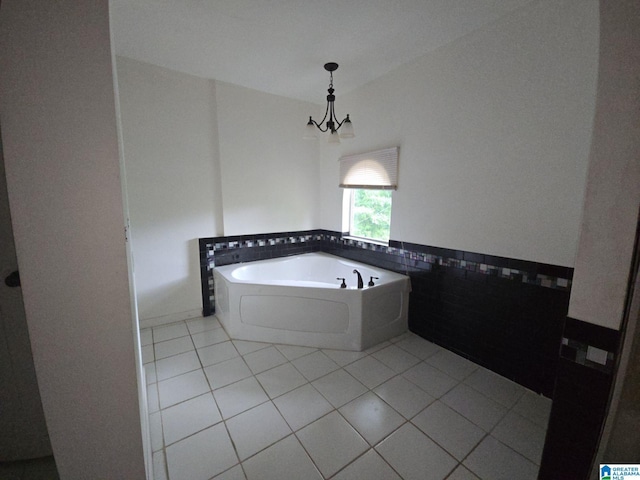 bathroom featuring tile patterned floors and a bathing tub