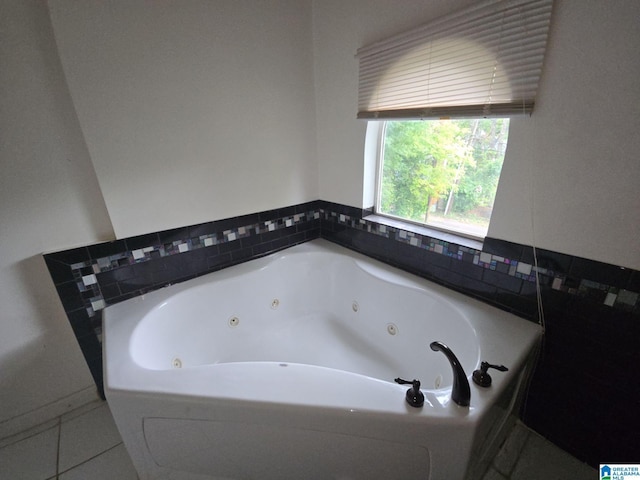 bathroom with tiled tub