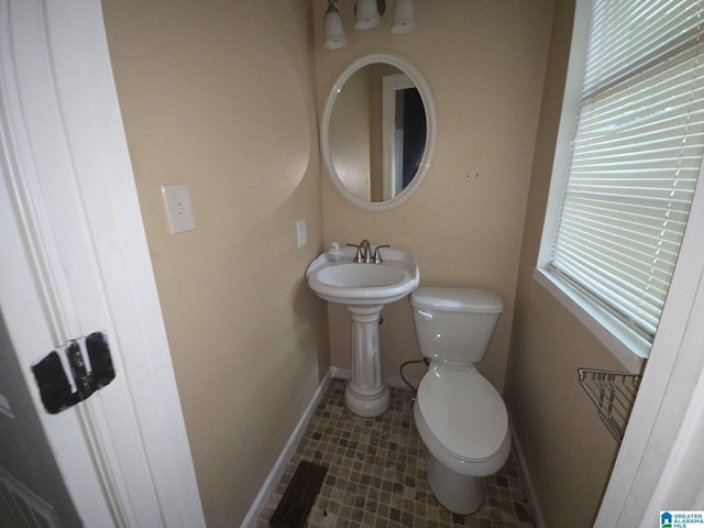 bathroom with sink and toilet