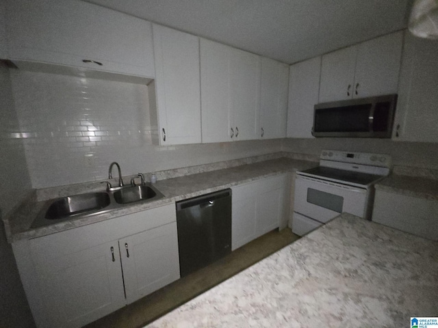 kitchen with sink, white cabinetry, dishwasher, and electric stove