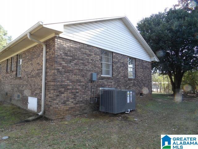 view of property exterior featuring central AC unit