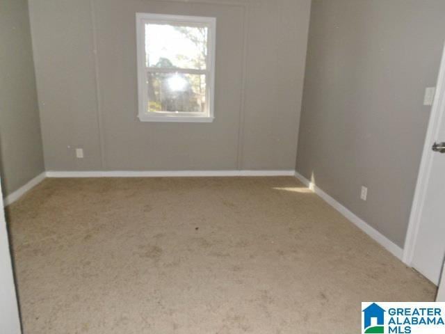 view of carpeted spare room