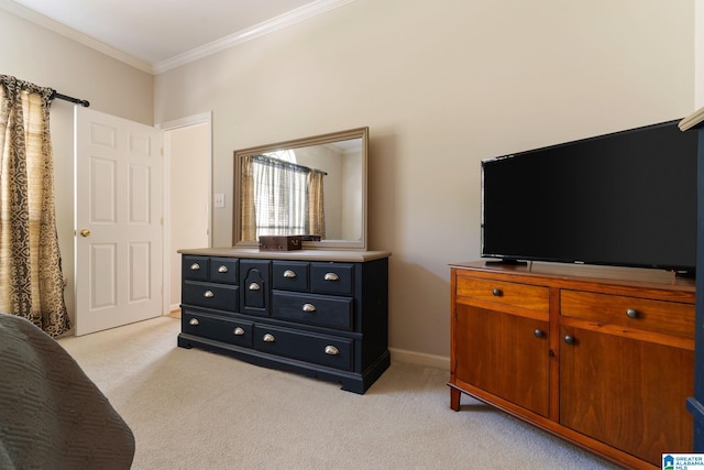 sitting room with crown molding and light carpet