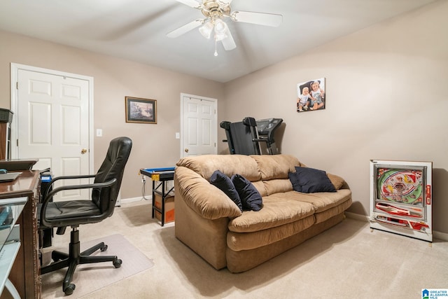 office featuring light colored carpet and ceiling fan