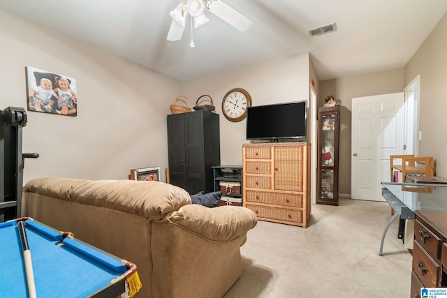 carpeted living room featuring ceiling fan and billiards