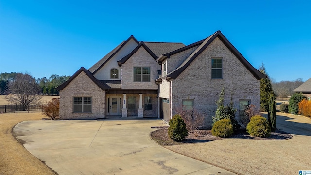 back of property featuring a garage