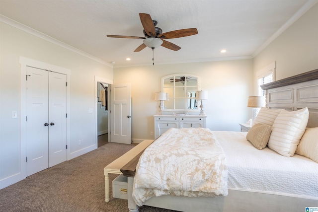 carpeted bedroom with ceiling fan, a closet, and ornamental molding