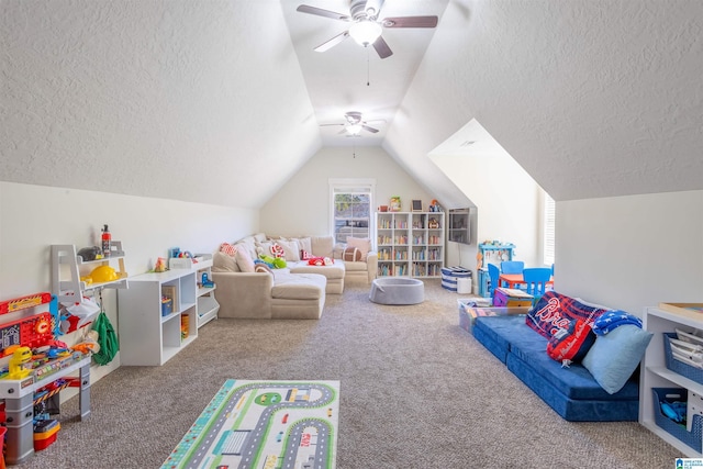 game room featuring carpet floors, vaulted ceiling, and a textured ceiling