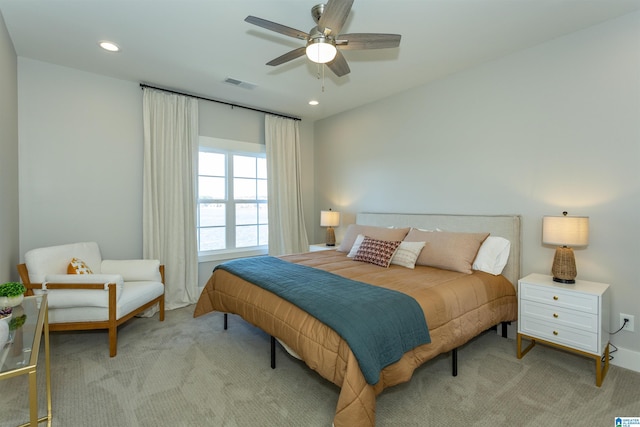 carpeted bedroom with ceiling fan