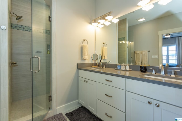 bathroom featuring vanity and walk in shower