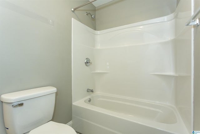 bathroom featuring  shower combination and toilet