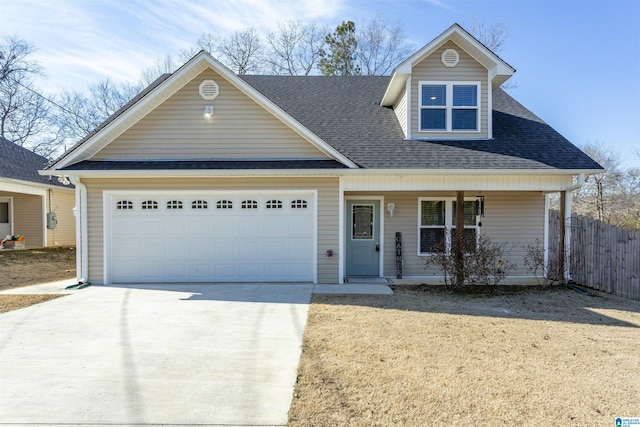 view of front facade with a porch and a garage