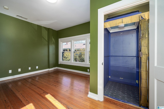 interior space with hardwood / wood-style flooring