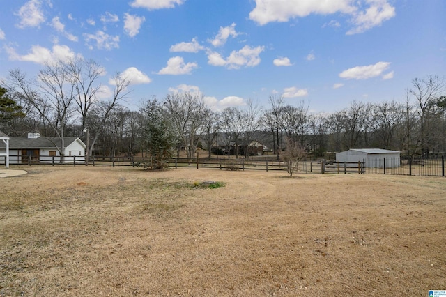 view of yard with a rural view