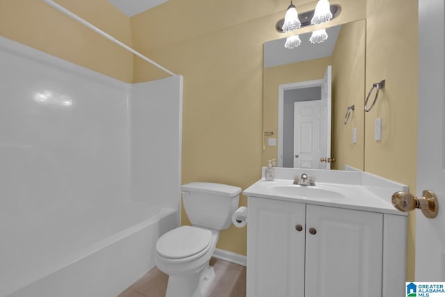 full bathroom with vanity, shower / washtub combination, and toilet