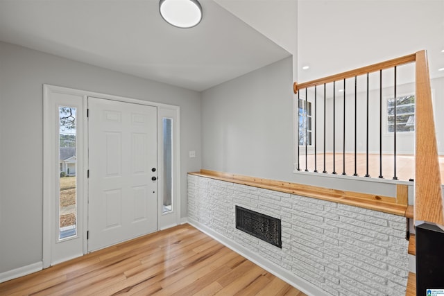 foyer entrance featuring wood-type flooring