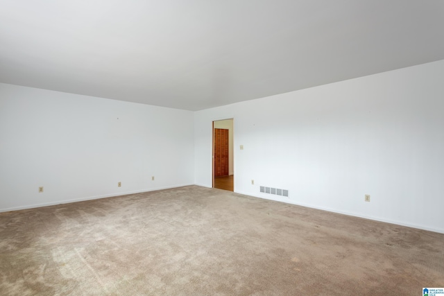 spare room with carpet floors