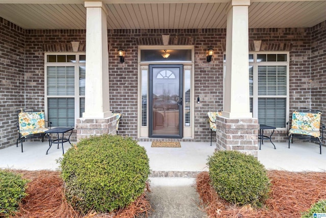 entrance to property with a porch