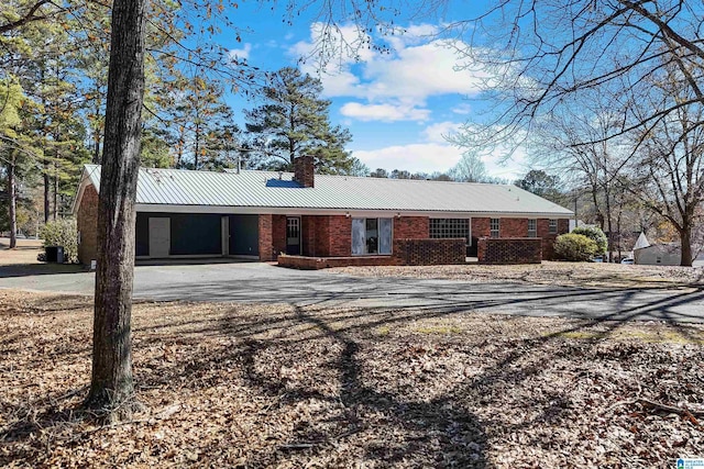 view of front of house featuring a carport