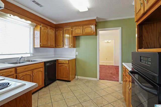 kitchen featuring sink, crown molding, black appliances, and light tile patterned floors