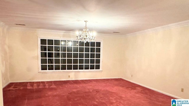 carpeted empty room featuring an inviting chandelier and crown molding