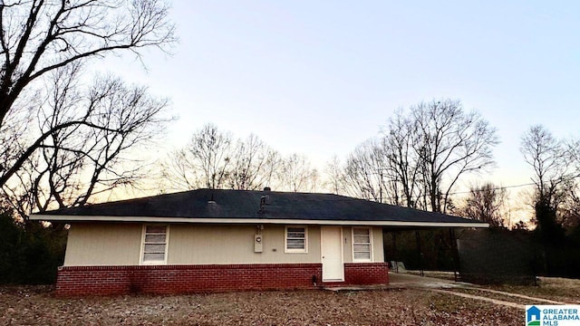 65 Wooley Rd, Brent, AL 35034 - view of front facade with brick siding and a carport